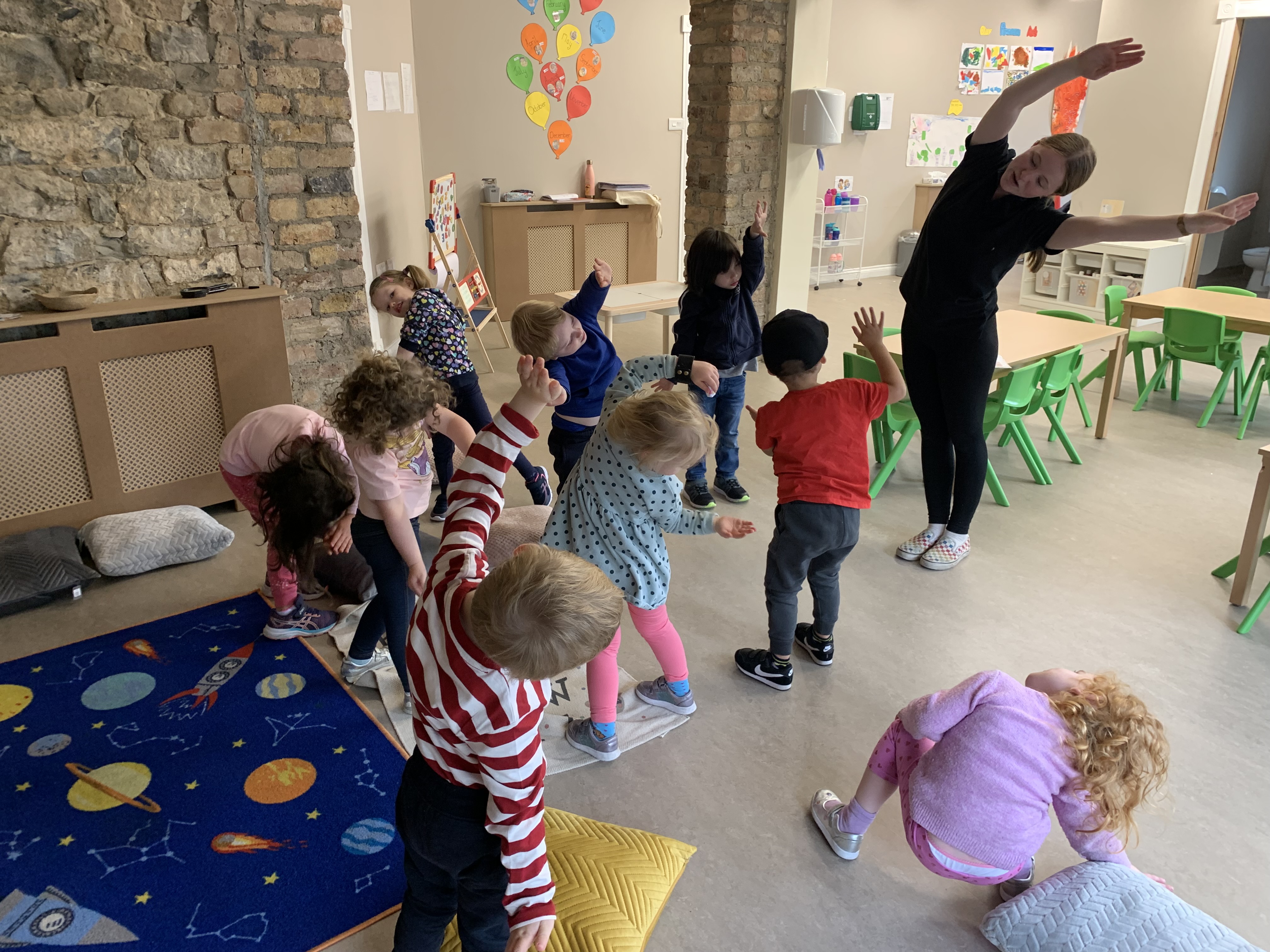 Preschoolers doing yoga